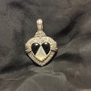 Judith Ripka SS heart shaped MOP/CZ/black onyx pendant made in Thailand